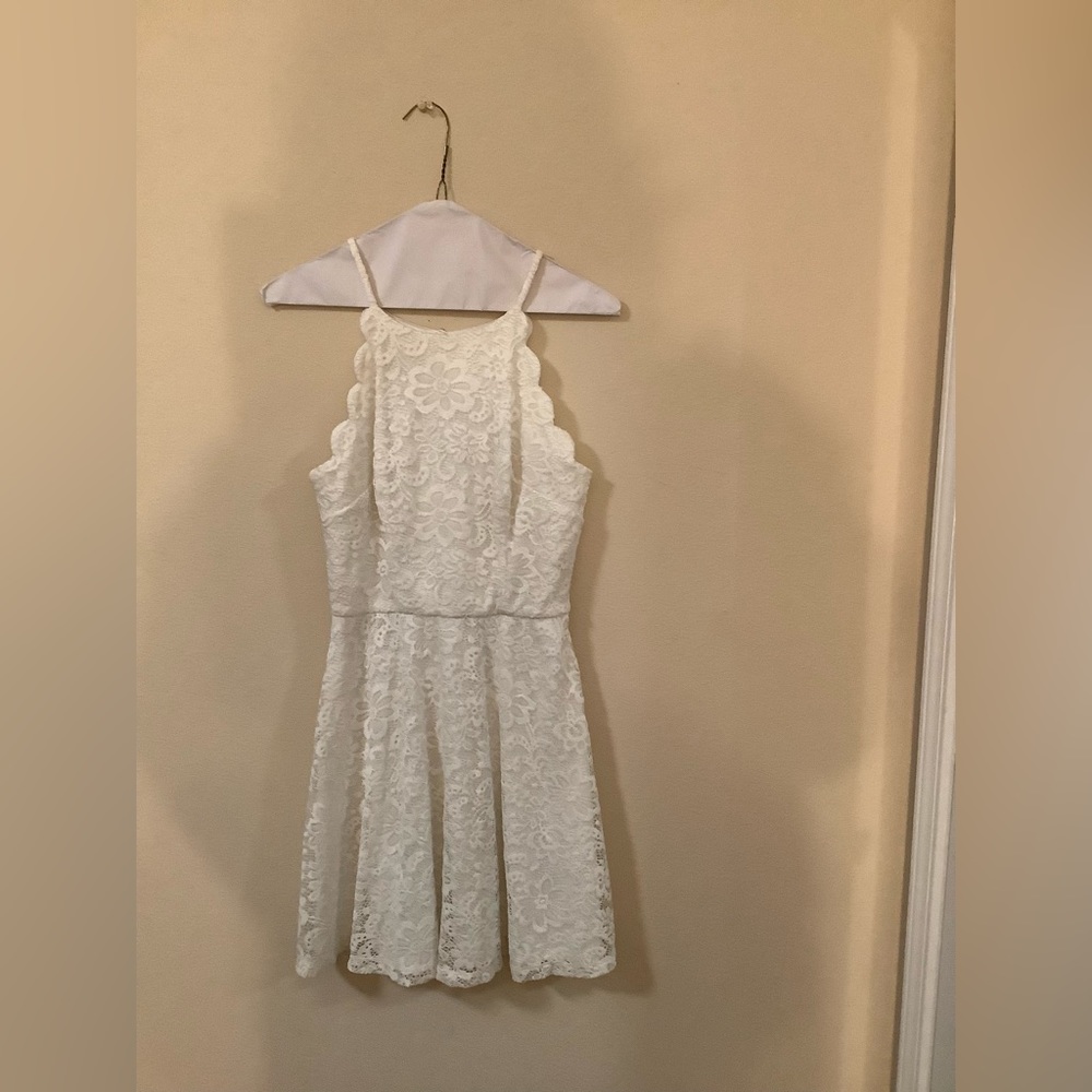 Like New White Lace Dress Beautiful Dress worn just once Dry Cleaned for you.